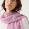 Woman Wears Featherweight Scarf in Wisteria