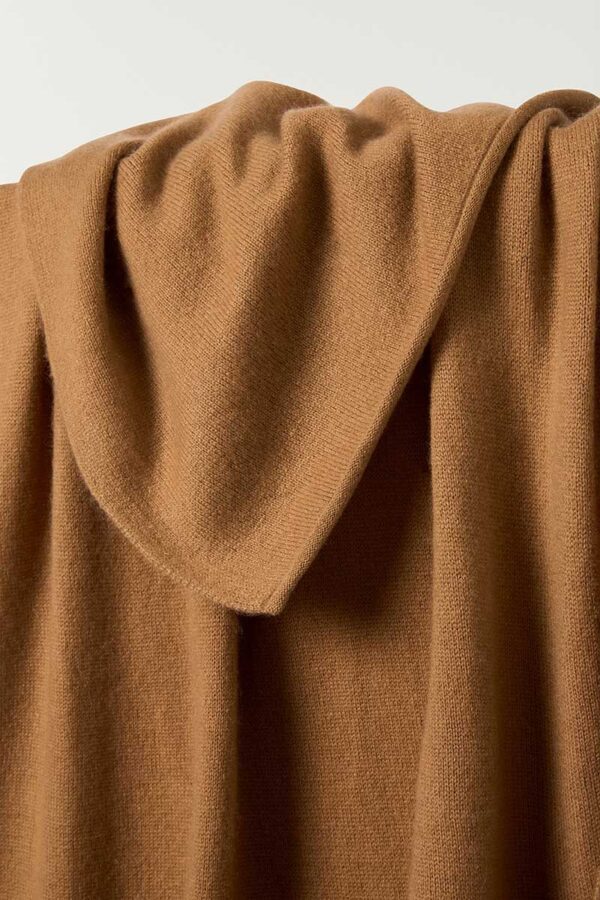 close up of cashmere travel wrap in spice