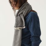 Cashmere handcrafted woven scarf in a striking pattern of navy and light taupe.